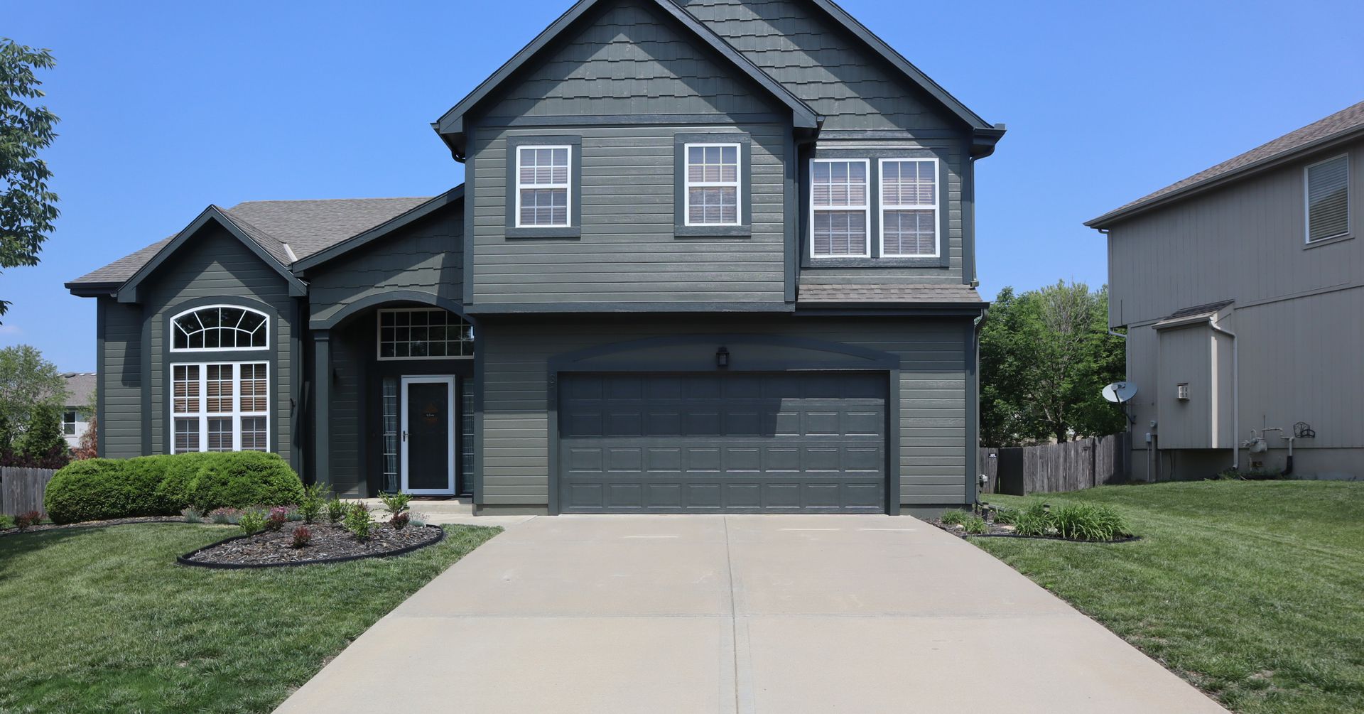 Home Pros Painting exterior house painted after Olathe KS