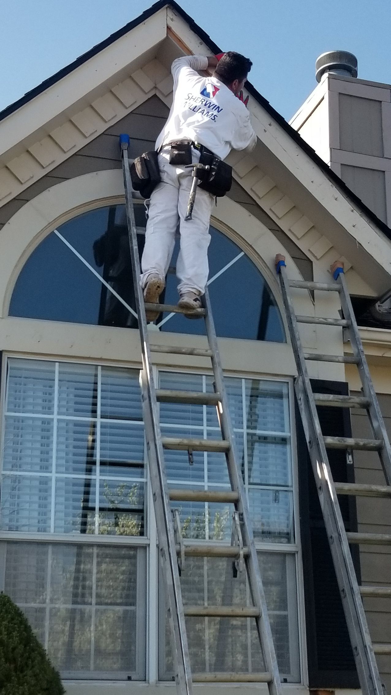 home pros painting worker replacing fascia board in gardner ks from home pros painting