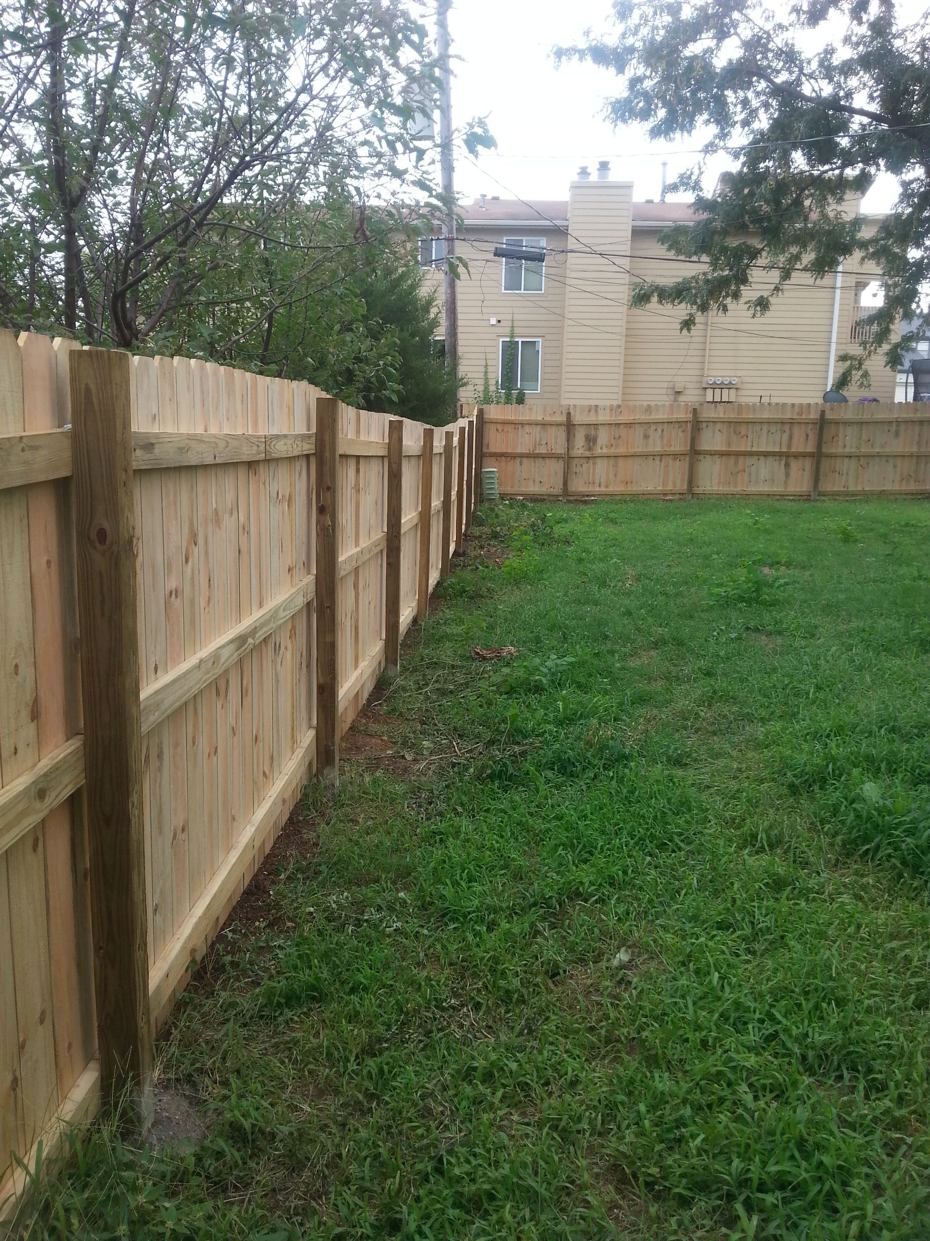 new wood fence Olathe KS by Home Pros Painting