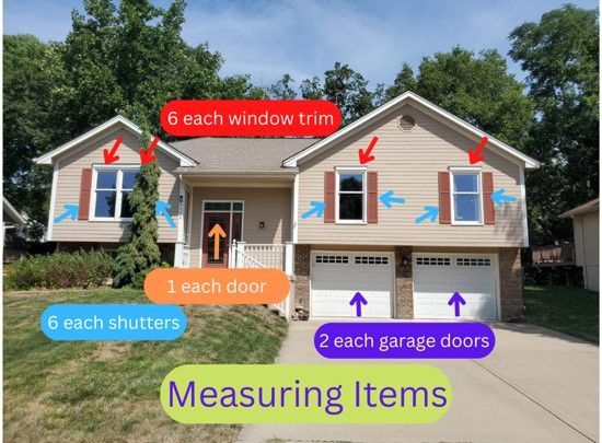 Split-level home with an overlay showing all of the item measurements of the front of the house, like doors, shutters, and garage doors.