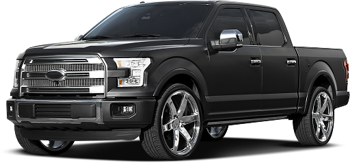 Black full-size pickup truck on a white background, angled front view | Dean's Tire & Auto
