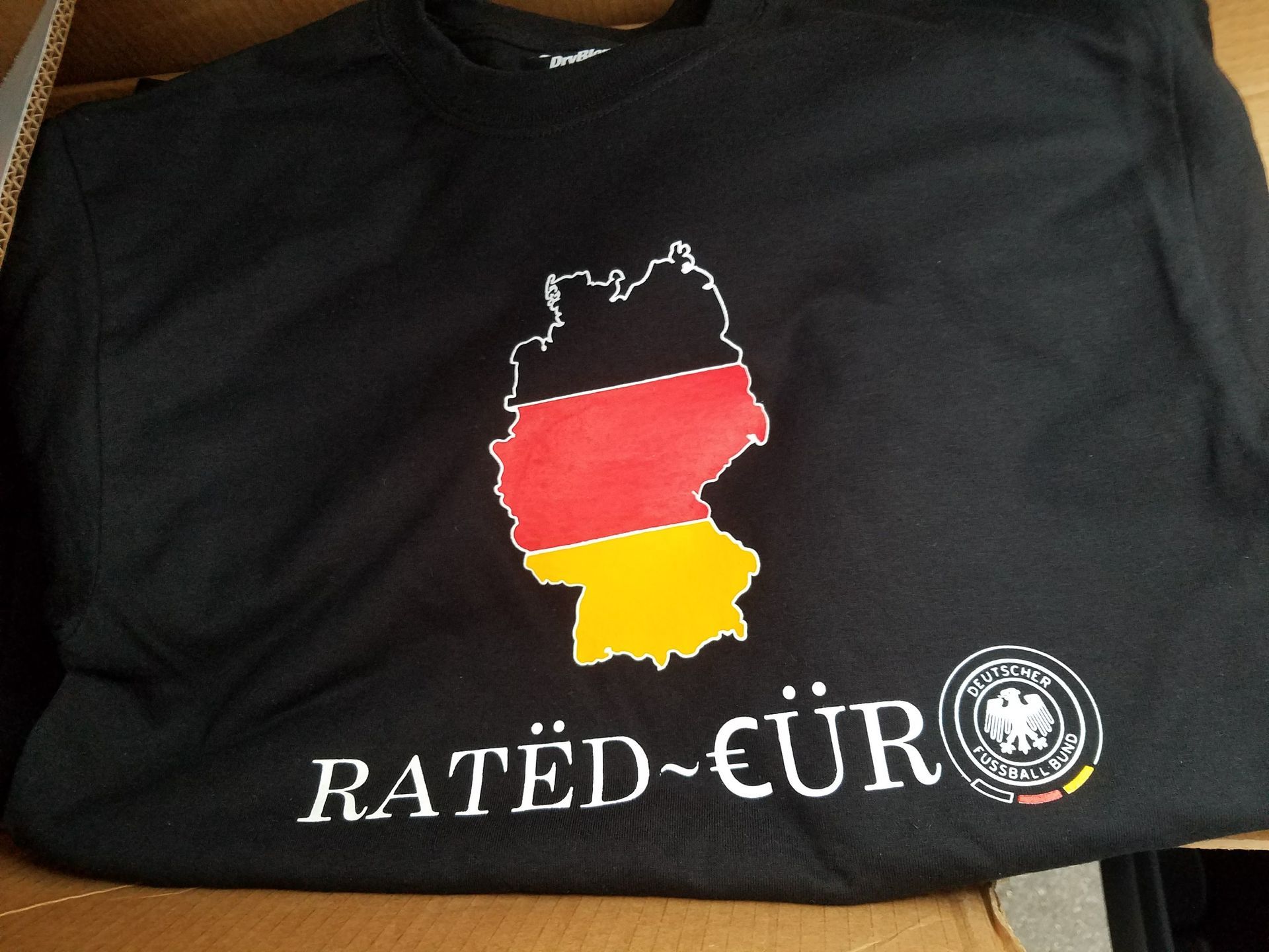 Black t-shirt featuring a map of Germany with the German flag colors and the text 