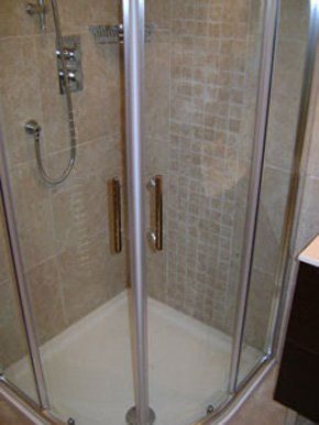 new bathrooms - Warrington, Cheshire - P.S. Plumbing & Heating - Metro walk in shower 