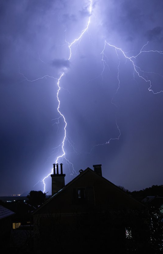 lightning behind house
