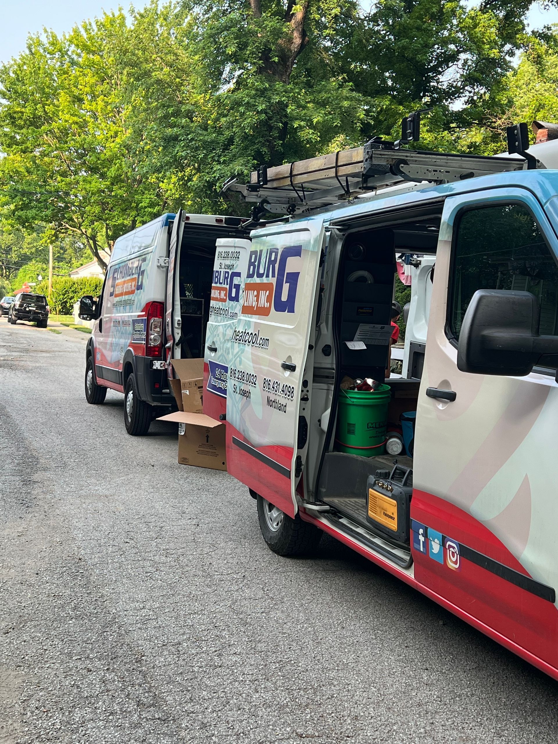 Schomburg service trucks with logos on outside
