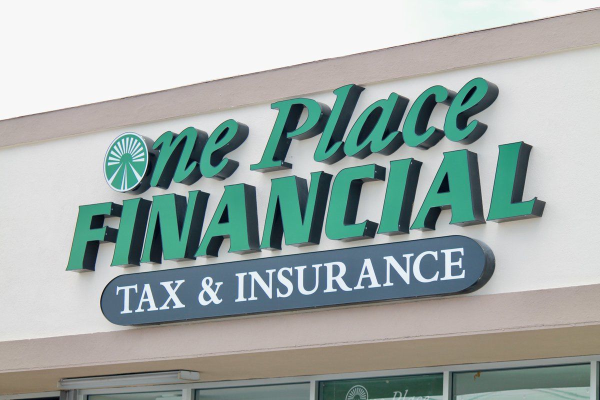 A sign for one place financial tax and insurance