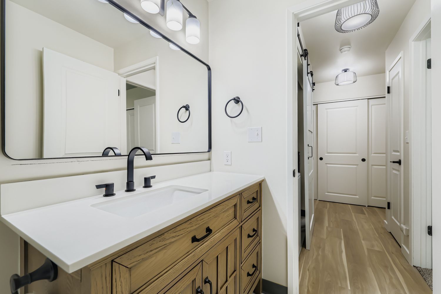 Photo of a large bathroom, with a wide sink