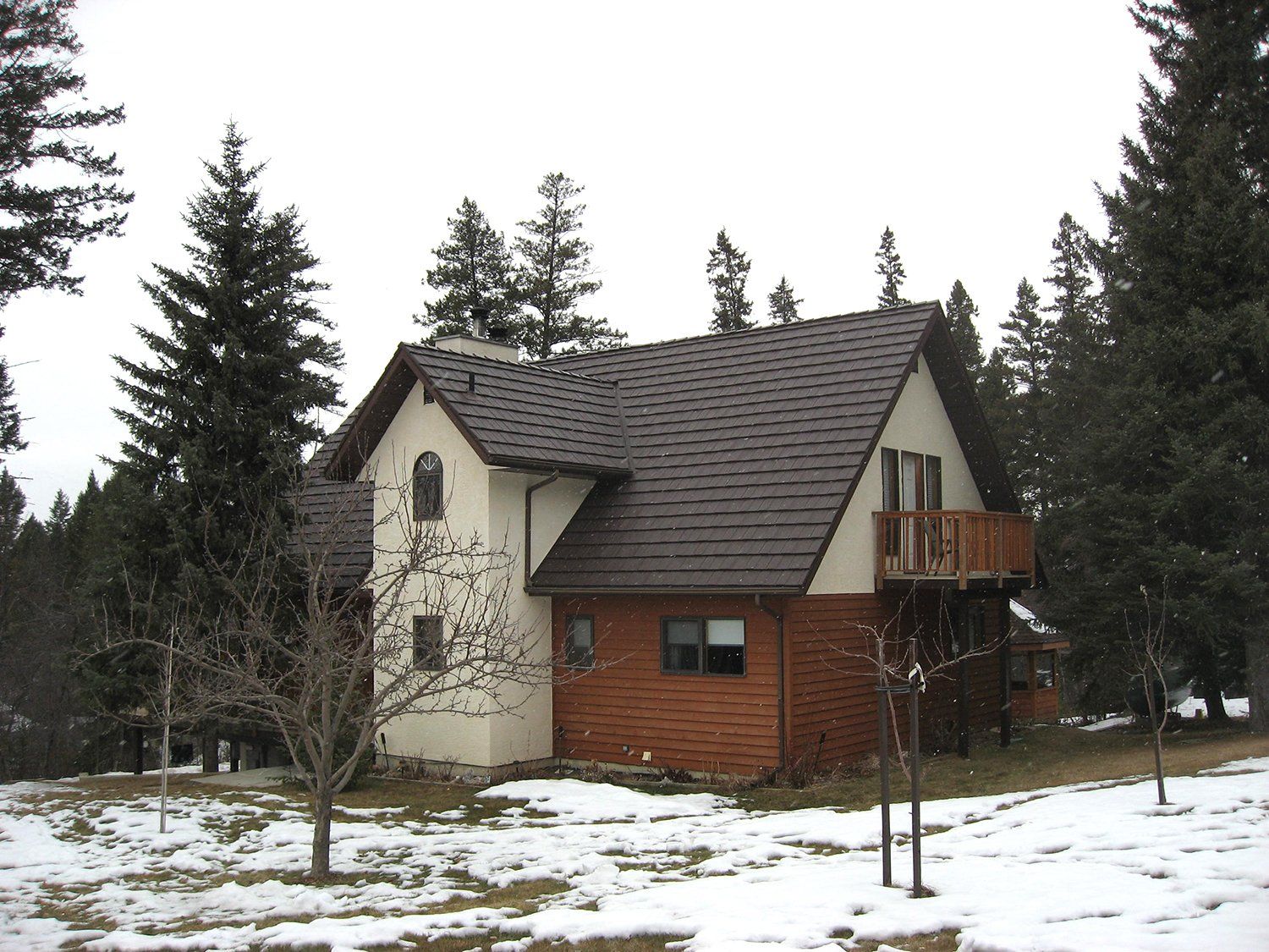 Colonial Brown Metal Shake Roof Snow