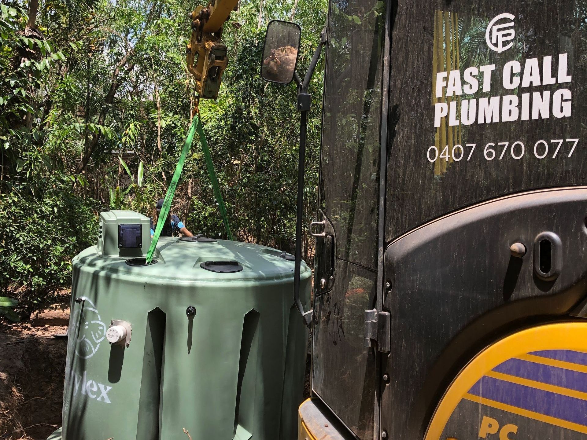 Lowering the tank by machine - Fast Call Plumbing & Pumping Darwin NT