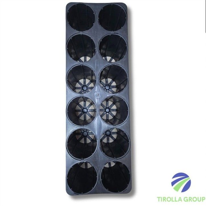 A black tray with a lot of holes in it