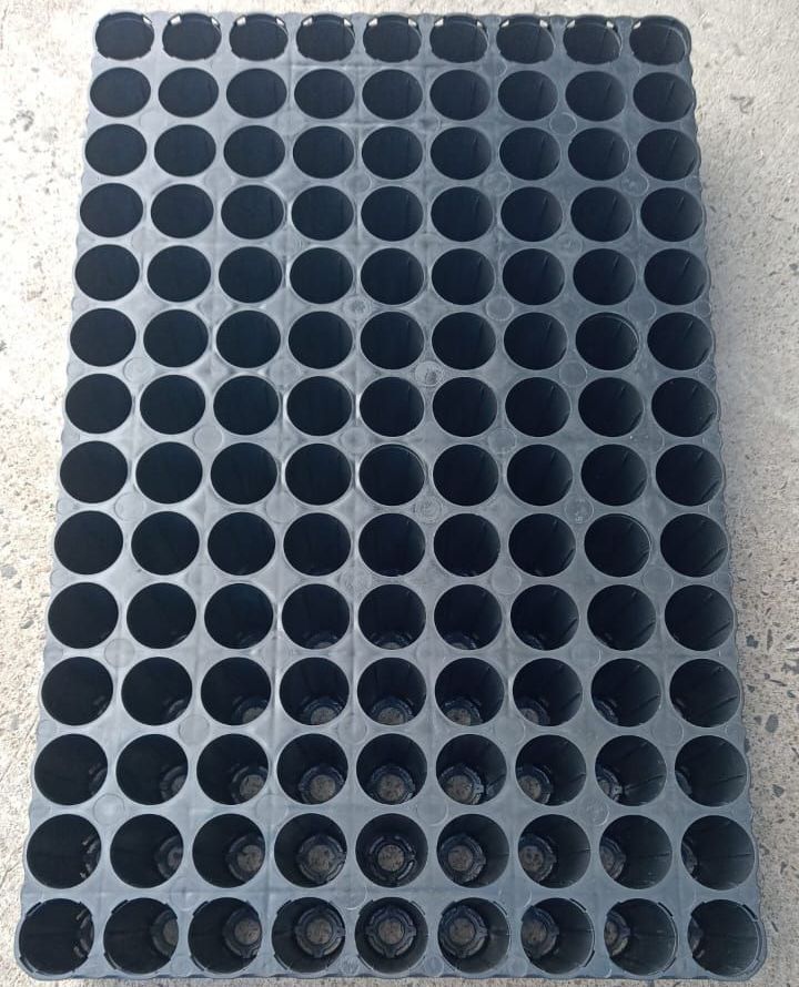 A tray of black plastic cups and a tray of black plastic cups on a white background.