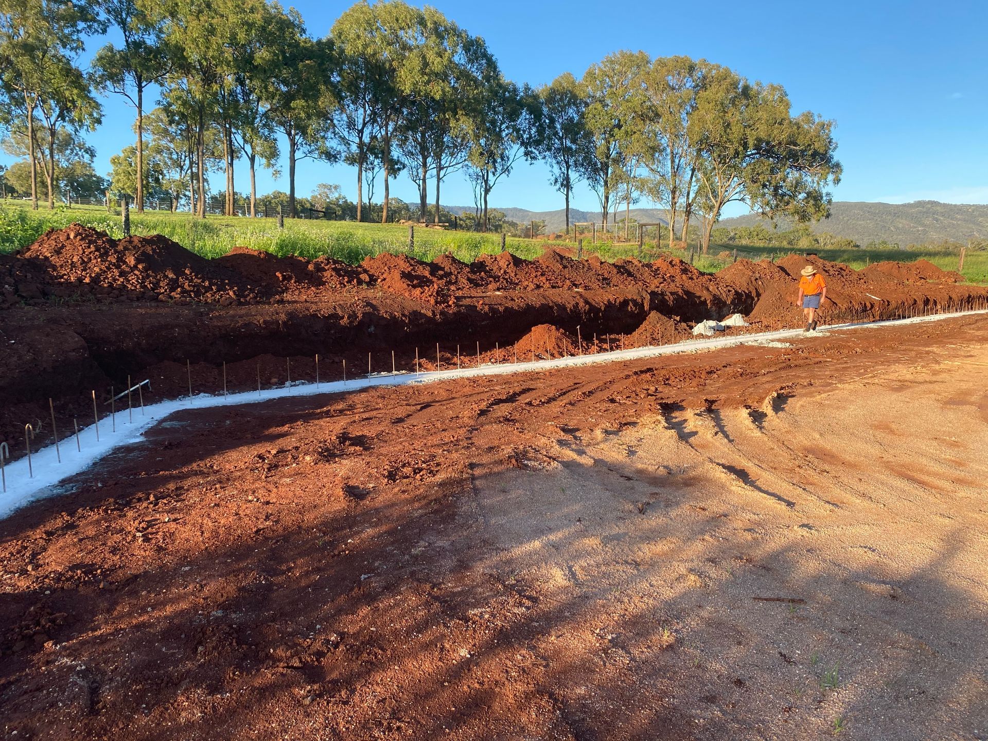 An Aerial View of A Residential Area with Houses and Garages — Watto's Earthmoving & Machinery Hire in Atherton, QLD