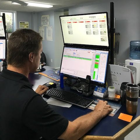 Team members with thumbs up