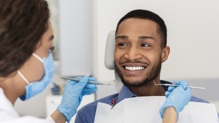 image of man at dentist
