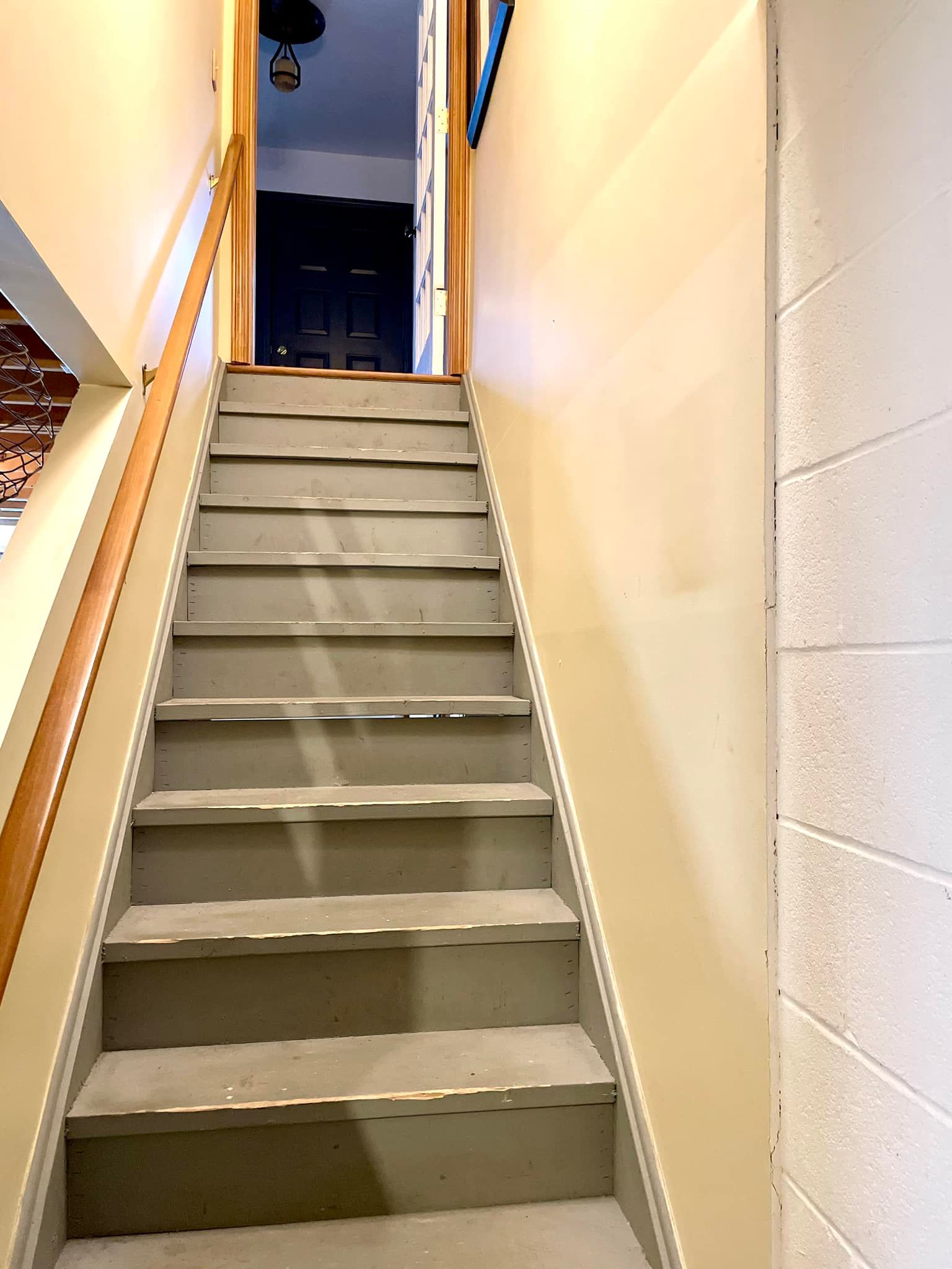 A set of stairs leading up to the second floor of a house