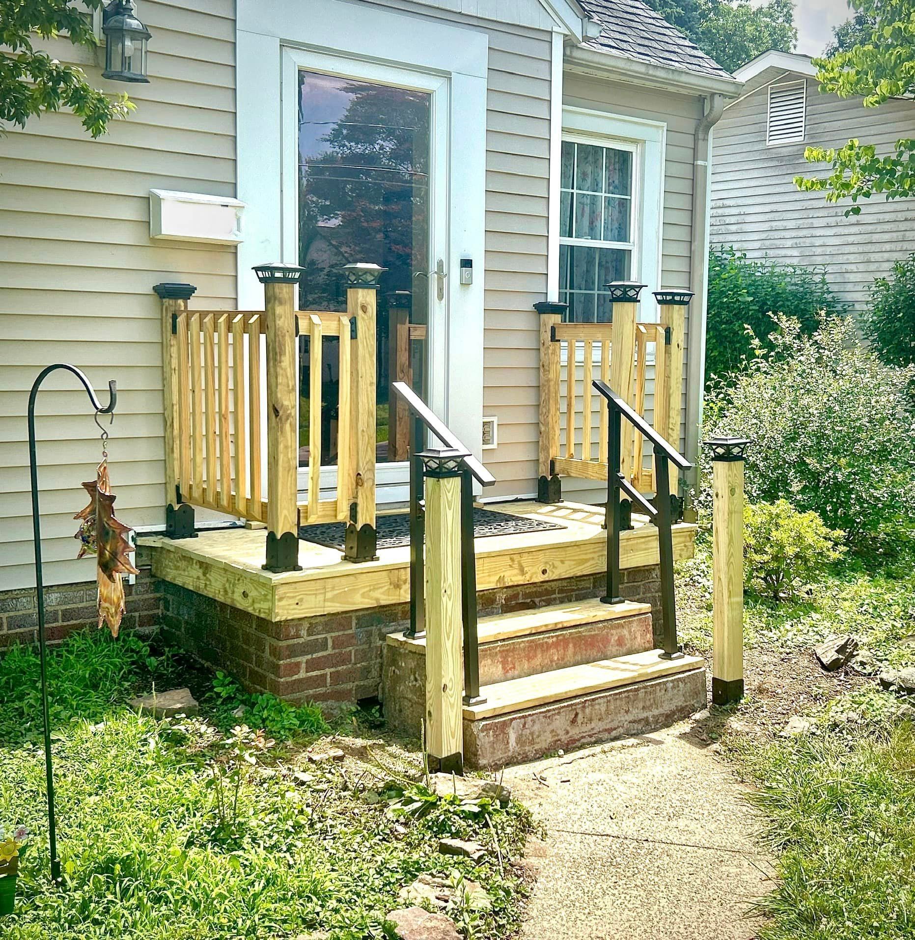 A house with a wooden porch and stairs