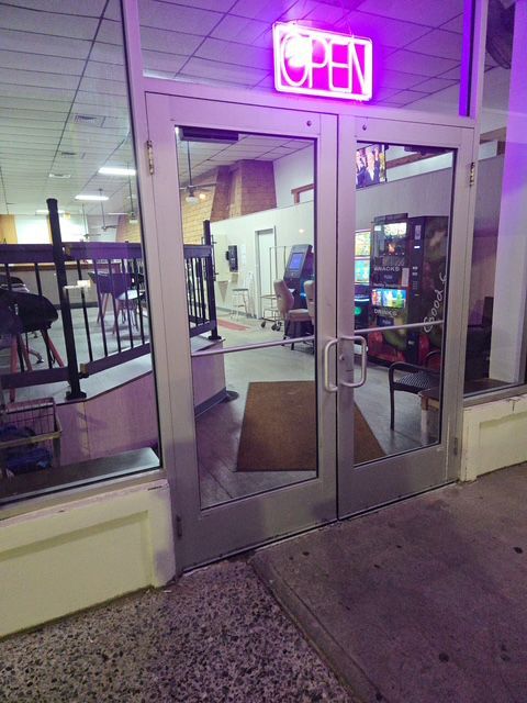 Exterior of an arcade with glass doors, 