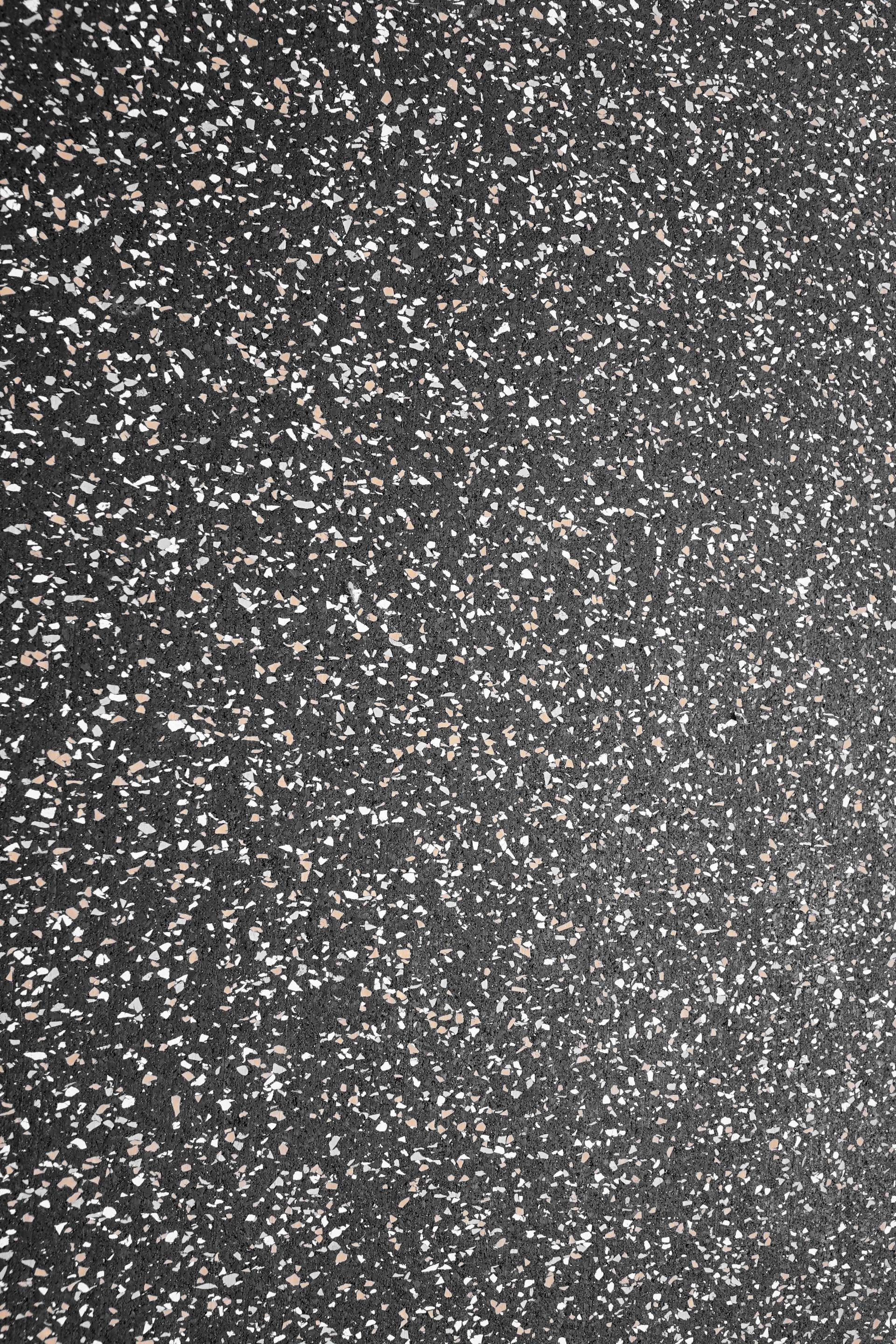 A close up of a black and white glitter background.