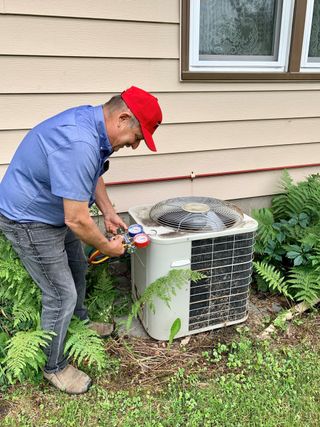 Air Conditioner Compressor Outdoor — White Bear Lake, MN — Reibel Heating & Air Conditioning
