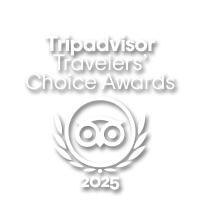 Tripadvisor Travelers' Choice Awards logo for 2025 in white, featuring the owl logo and wreath on a transparent background.