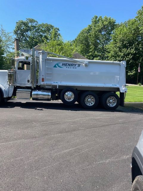 A newly paved driveway in a residential neighborhood