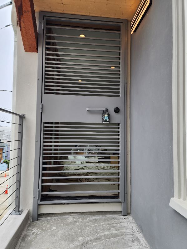 A door with a shutter on it and a lock on it