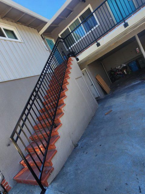 A set of stairs leading up to the second floor of a house