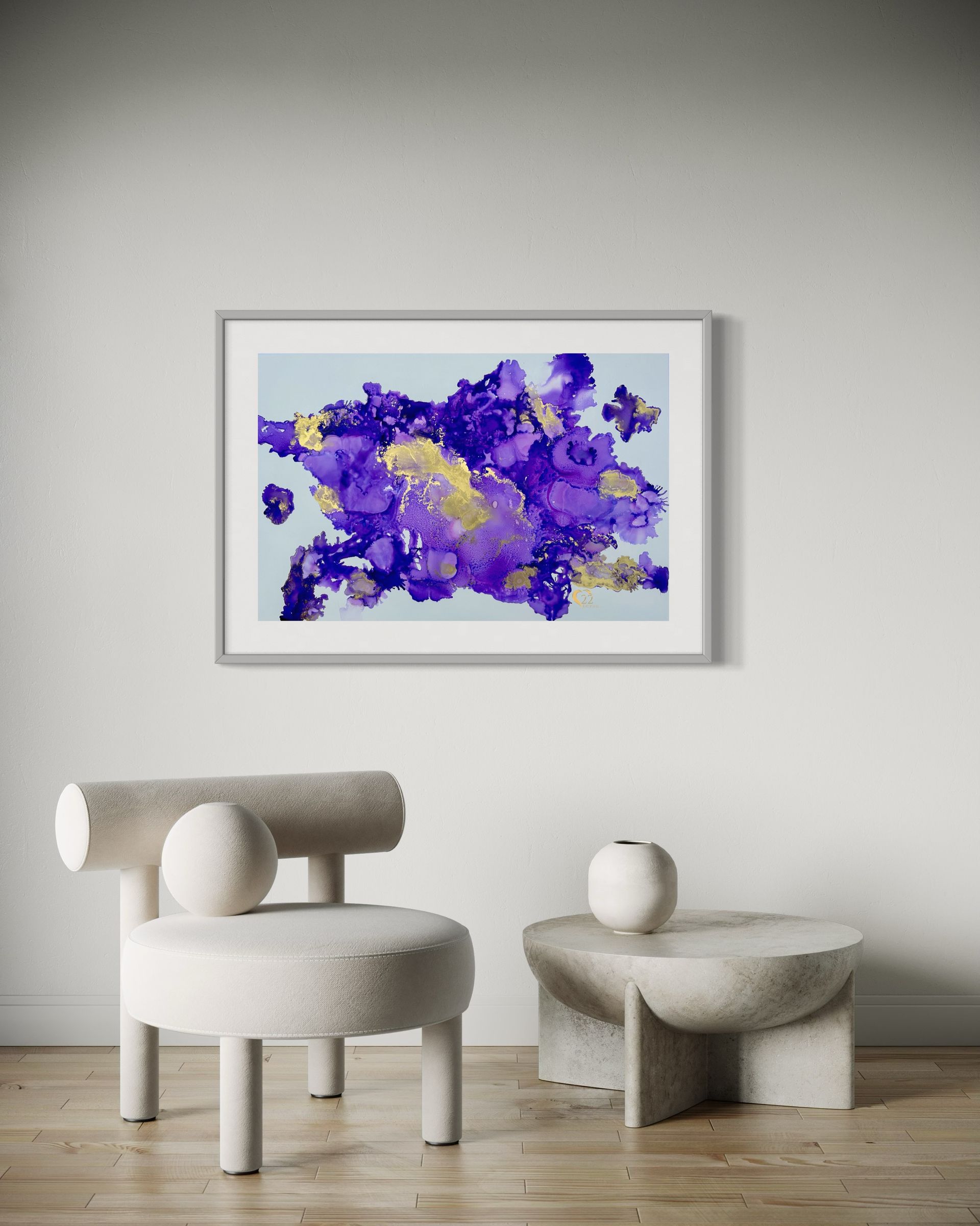 A living room with two chairs and a painting on the wall.