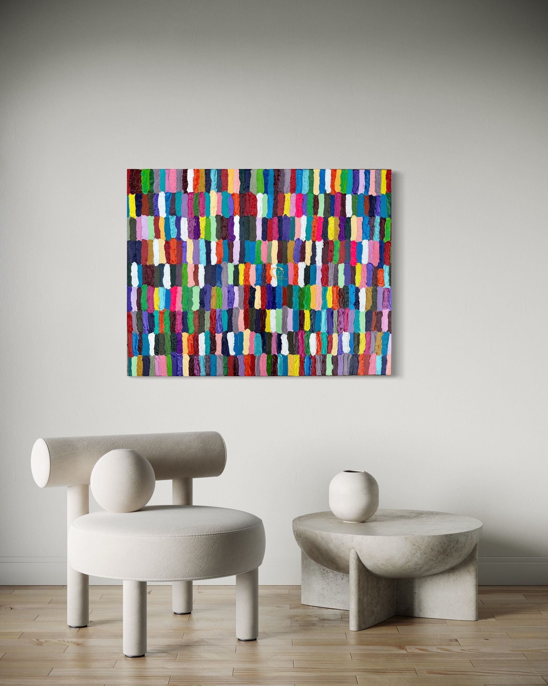 A living room with two chairs and a painting on the wall.