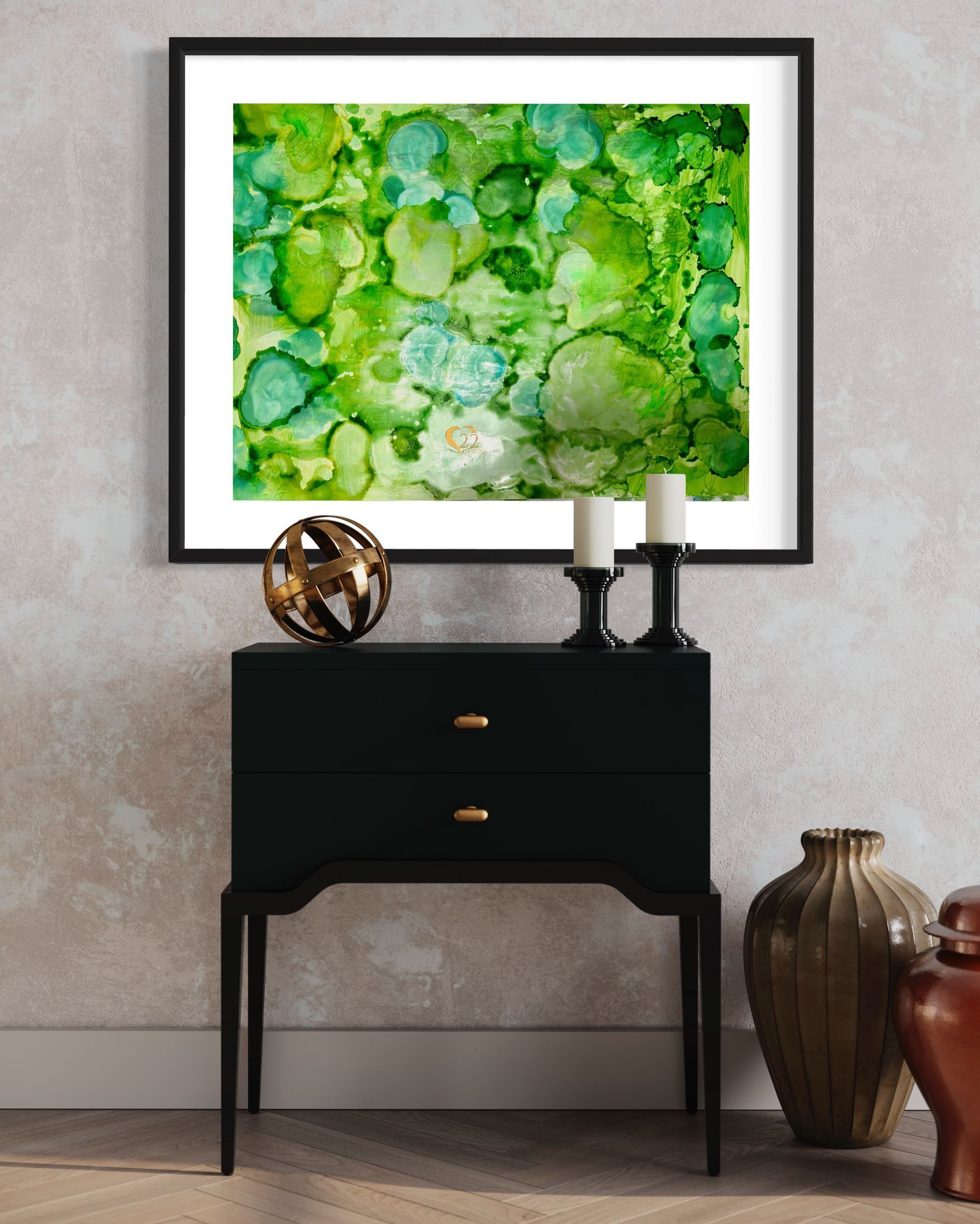 A framed green and blue painting hangs above a black dresser