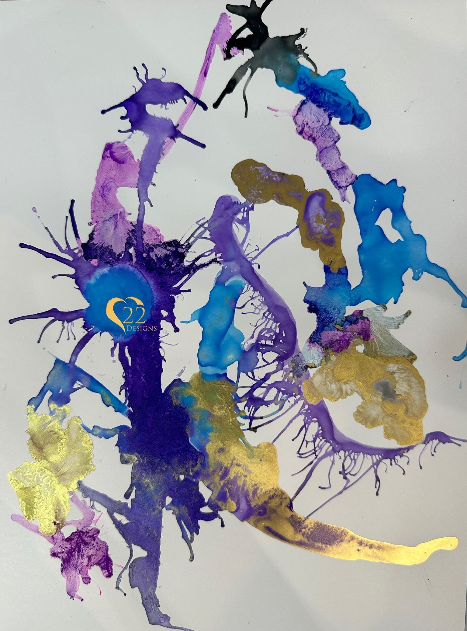 A close up of a painting with purple and blue paint