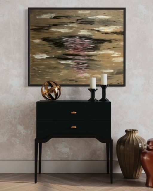 A painting on a wall above a black table