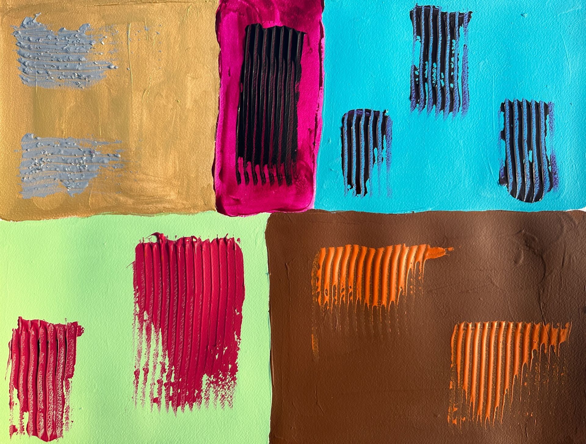 A bunch of different colored paintings on a piece of paper