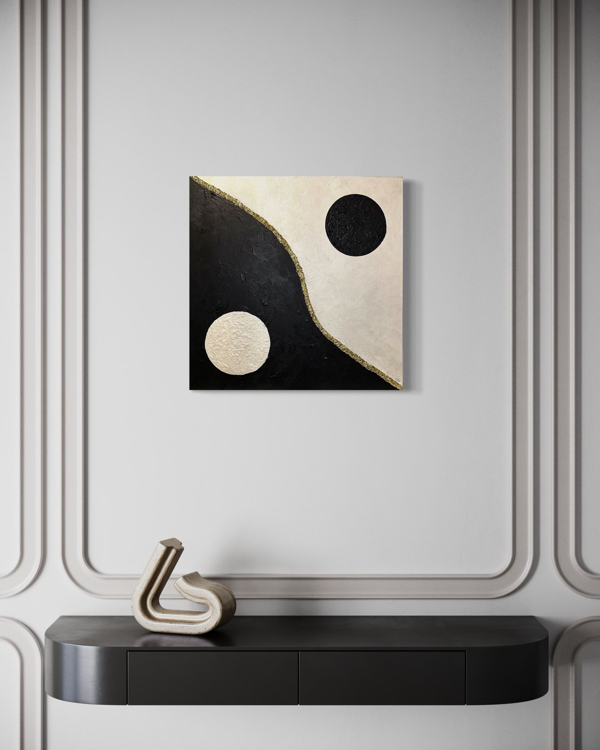 A wall with a painting of a yin yang symbol on it