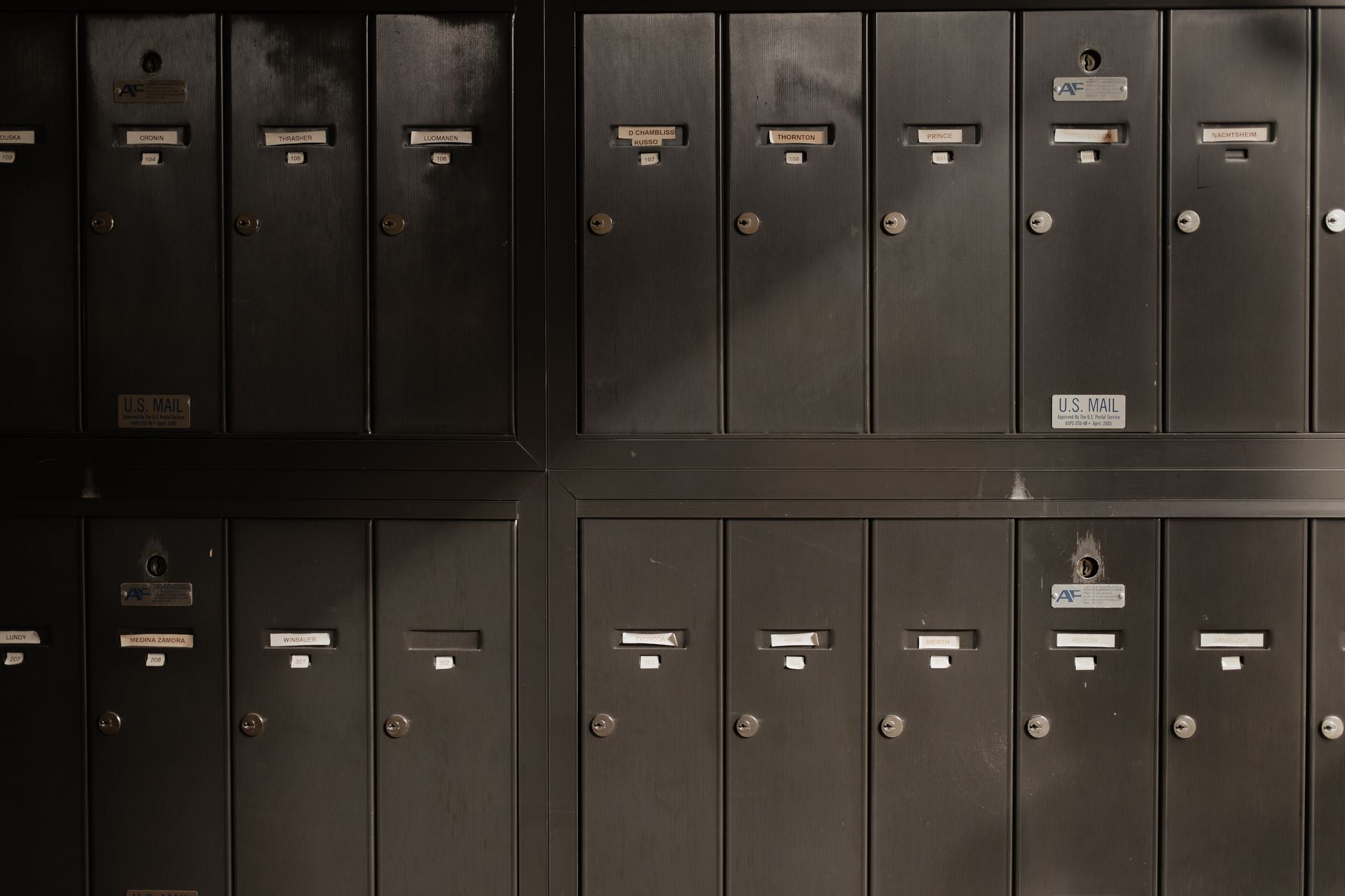 Black vintage mailboxes. Apartment in South Minneapolis by RightMove Properties.