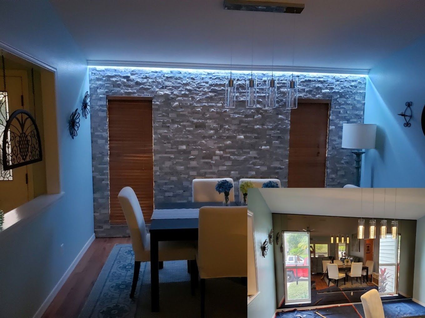 A dining room with a table and chairs in it.