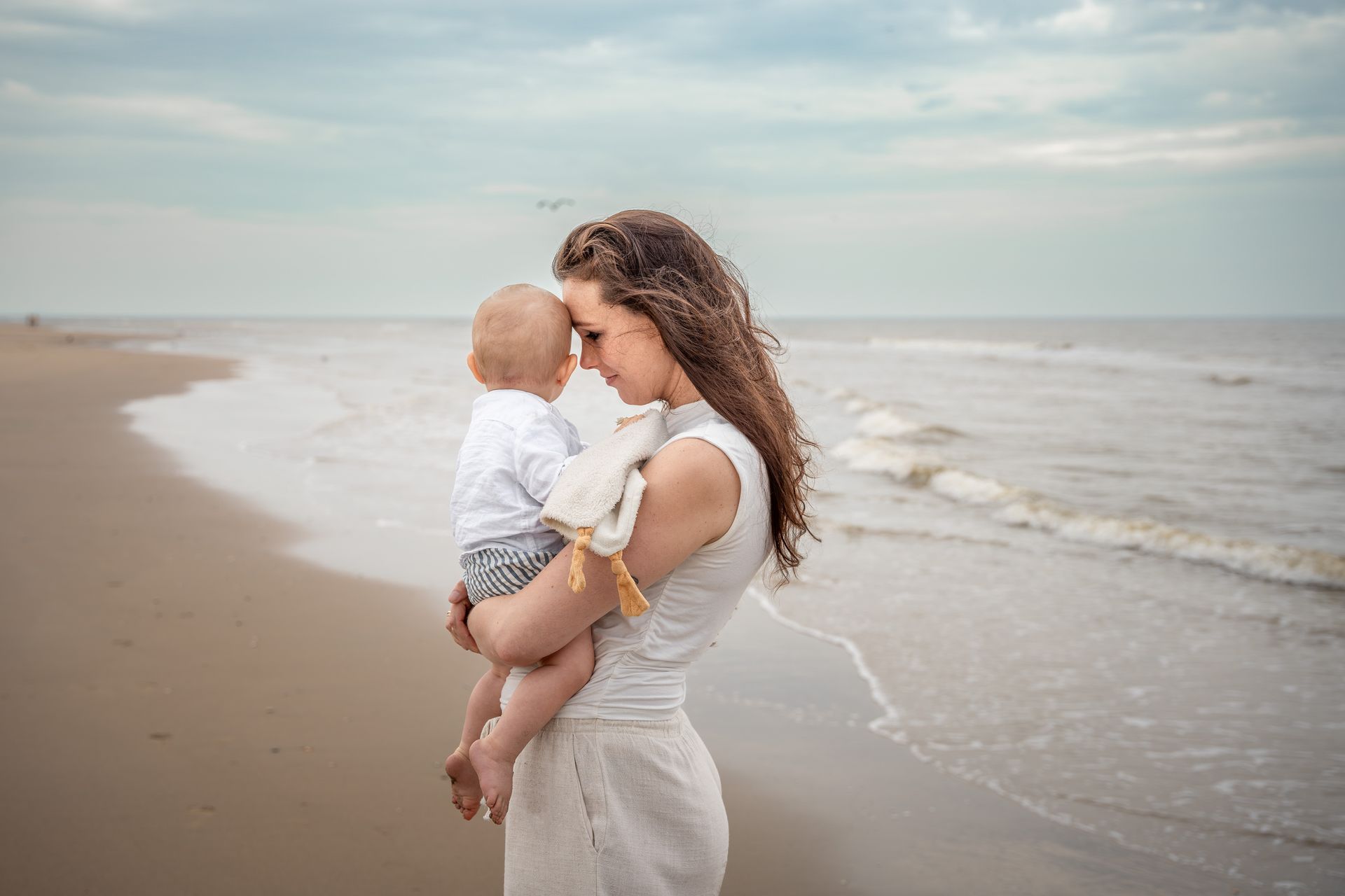 Motherhood fotoshoot op het strand