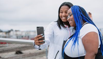 girls taking selfie