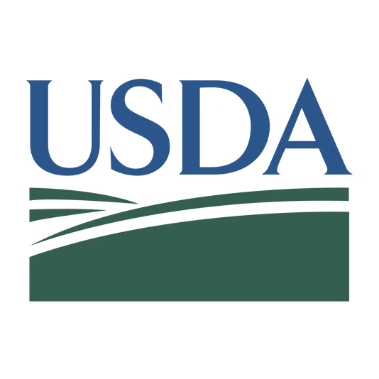 USDA logo with blue text over a green landscape.