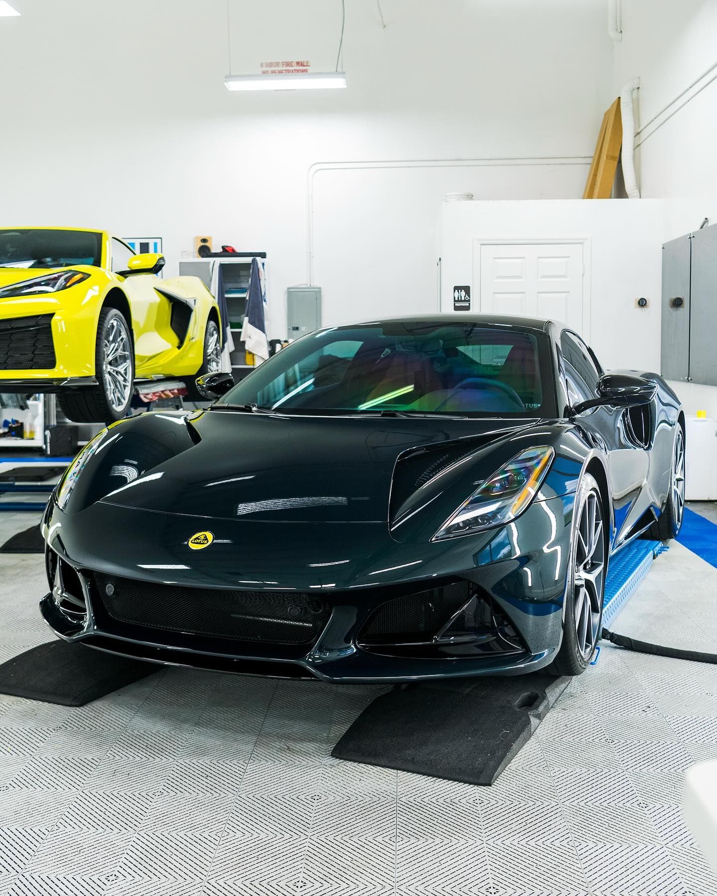 Lotus sports car with ceramic coating protection in a detailing shop