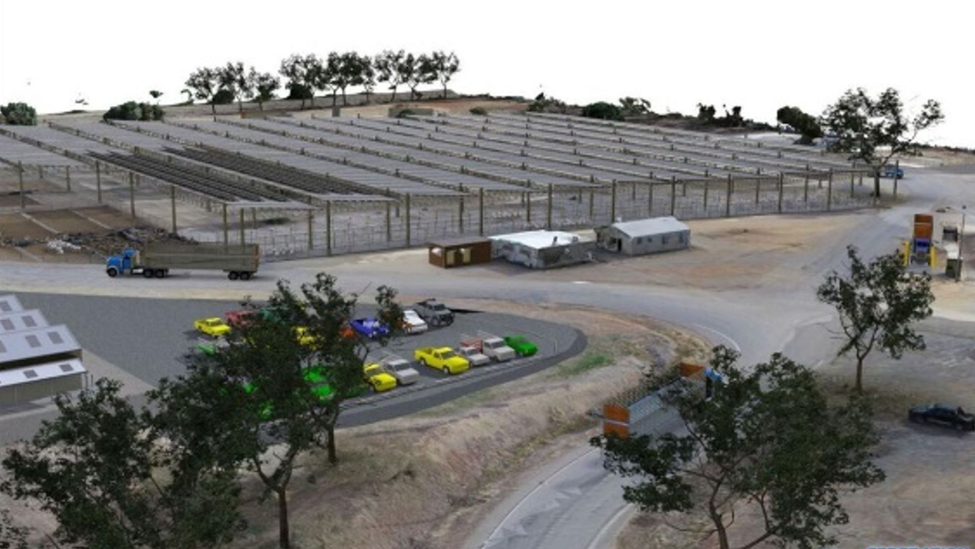 An aerial view of a parking lot with a lot of cars parked in it.