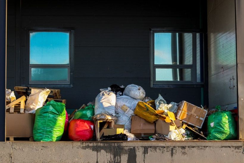 Lots of junk in front of a house