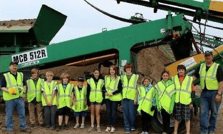 The Cape Elizabeth Elementary and Middle School Robotics Club visits Skip Murray at his gravel pit in Cape Elizabeth to learn about the mechanics and functions of large equipment.