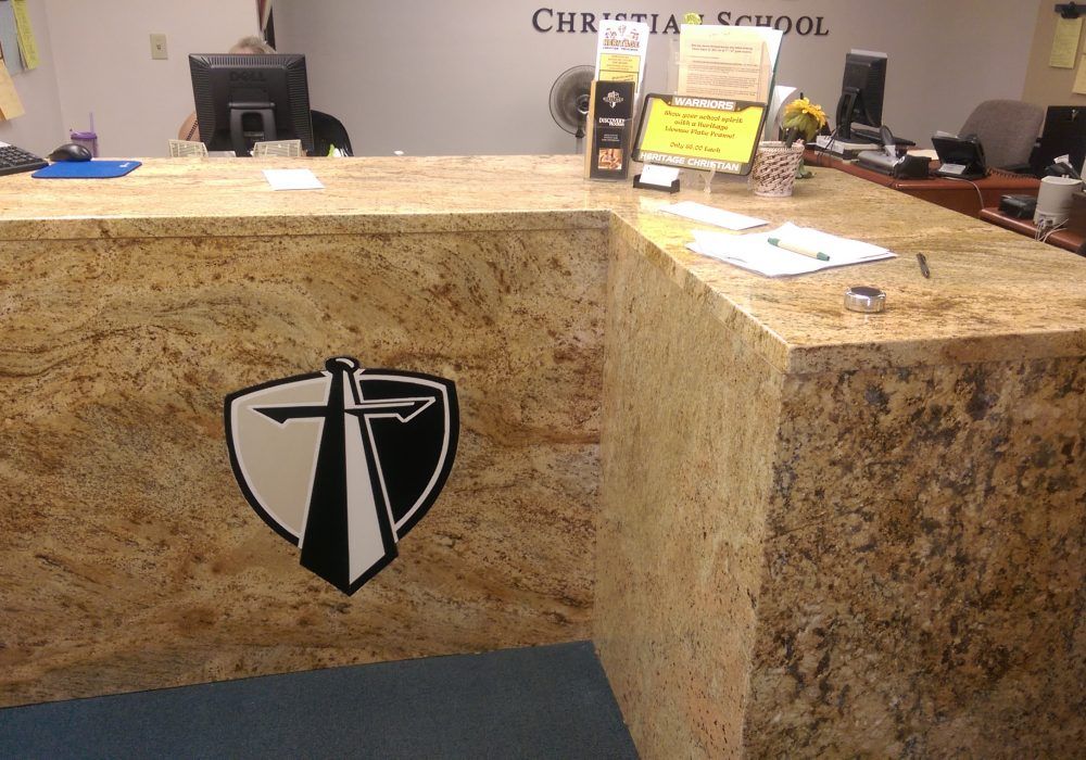 A counter with a logo on it that says christia school