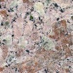 A close up of a granite counter top with a marble texture.