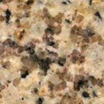 A close up of a granite counter top with a lot of small stones on it.