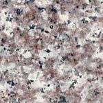 A close up of a granite counter top.