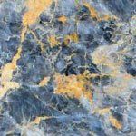 A close up of a blue and gold marble texture.