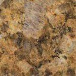 A close up of a brown granite counter top.