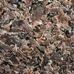 A close up of a brown granite texture.